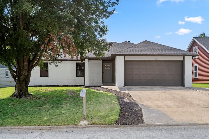 Five minutes to downtown Bentonville and already move in ready—this home delivers the updates you want without the to do list. Fresh paint, new trim, and updated flooring flow through every room, giving the space a crisp, modern feel. The kitchen is both functional and stylish with slow close cabinets and drawers, updated plumbing and lighting, plus a new dishwasher. Bathrooms have been refreshed, new doors installed, and the big ticket items checked off: new roof, new water heater, and a brand new deck waiting for summer evenings. Washer, dryer, and refrigerator all stay, so you can skip the moving day appliance shuffle. Whether you’re walking into town, hopping on a nearby trail, or simply enjoying the peace of your own space, this home is equal parts convenience and comfort—proof that “location, location, location” really does make all the difference.