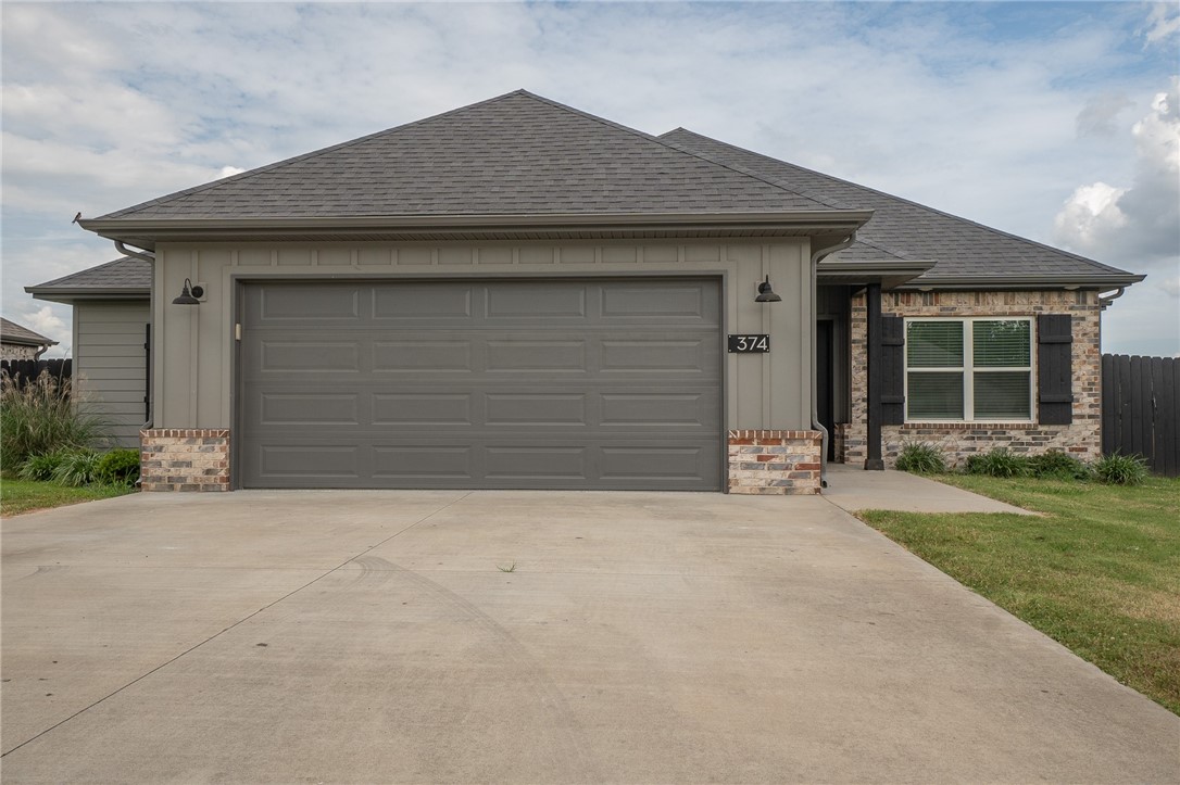 Beautiful 4 BR/2 BA home in Farmington has the perfect location for easy access to either Fayetteville or Farmington. Freshly painted throughout with new dishwasher, microwave, and range, plus new bedroom carpeting. Epoxy flooring in garage. Fenced backyard and patio for outdoor living. This gem won't last long! Agent owned.