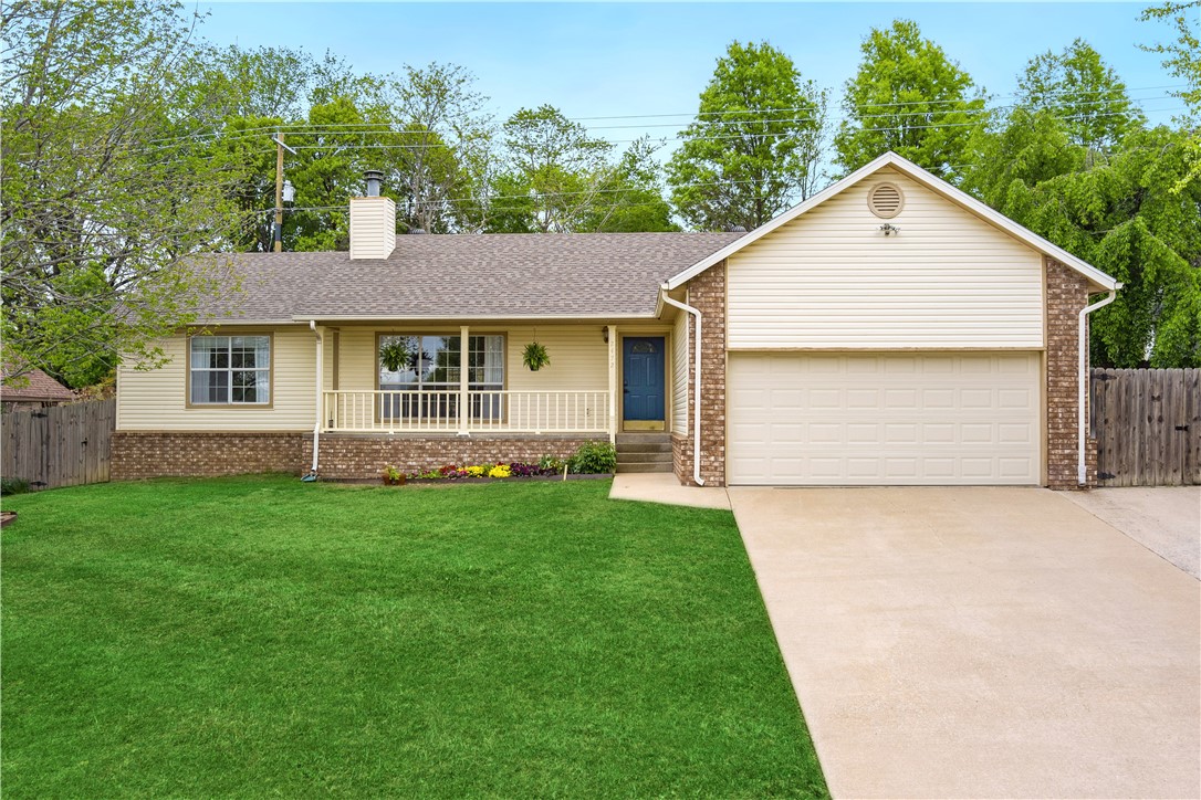 Welcome to this inviting 3 bedroom, 2 bathroom home, situated close to Interstate 49 & 71 Business, and the Uptown Fayetteville District. The home features solid floors throughout, providing a warm and welcoming atmosphere, and lots of natural light pouring through the many windows. You'll love the oversized primary bedroom with a spacious walk-in closet, and the fenced-in backyard is perfect for relaxing and enjoying the outdoors in privacy. The home has been impeccably cared for and maintained, ensuring it is move-in ready. Don't miss out on the opportunity to live in a comfortable, convenient, and sunlit home in a prime location. Schedule a showing today.