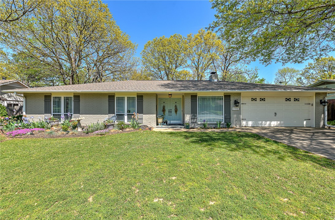Talk about a hidden gem! This impeccably maintained home is right in the heart of Fayetteville. As you walk in, you're greeted with sky-light filled spaciousness and openness of the living room. Your eyes are drawn to the sunroom with tons of windows showcasing a beautifully landscaped back yard. It will be your favorite room in the house! The eat-in kitchen boasts a large, custom made movable island perfect for entertaining, quartz countertops and tons of storage. The large main suite has a large walk-in closet and a sky-light filled bathroom with double vanity, soaking tub and shower. Your summers will be so peaceful enjoying the serene backyard and mature trees and landscape. Just a couple of minutes from Gulley Park, schools, shopping and restaurants.