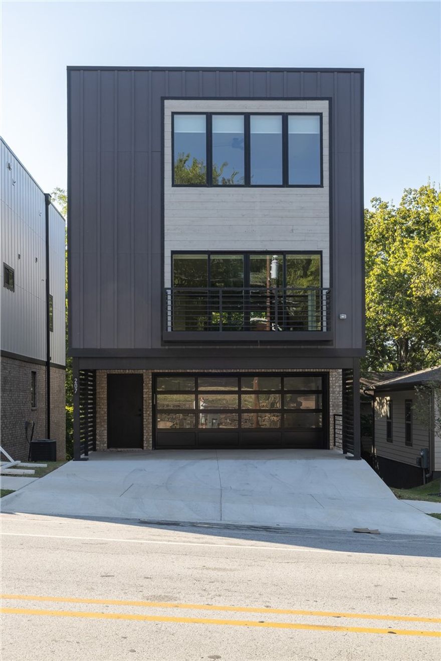 Beautiful, modern, MOVE IN READY RENTAL in downtown Fayetteville! This FULLY FURNISHED home offers 2,715 heated sq ft and includes 3 bedrooms all with on-suite bathrooms, a half bathroom, open eat in kitchen to a generous sized living room, and laundry. Amenities include a large walk in pantry, white oak hardwood floors throughout, built ins, stainless steel appliances, 5 burner gas range with double ovens, tankless hot water heater, storage, covered patio, TPO roofing, 2 car garage with side storage and a private entry. This property is really in the perfect location!! Walkable to Downtown Fayetteville, Walton Arts Center, and Old Main but on a more residential street that provides a nice hometown feel!