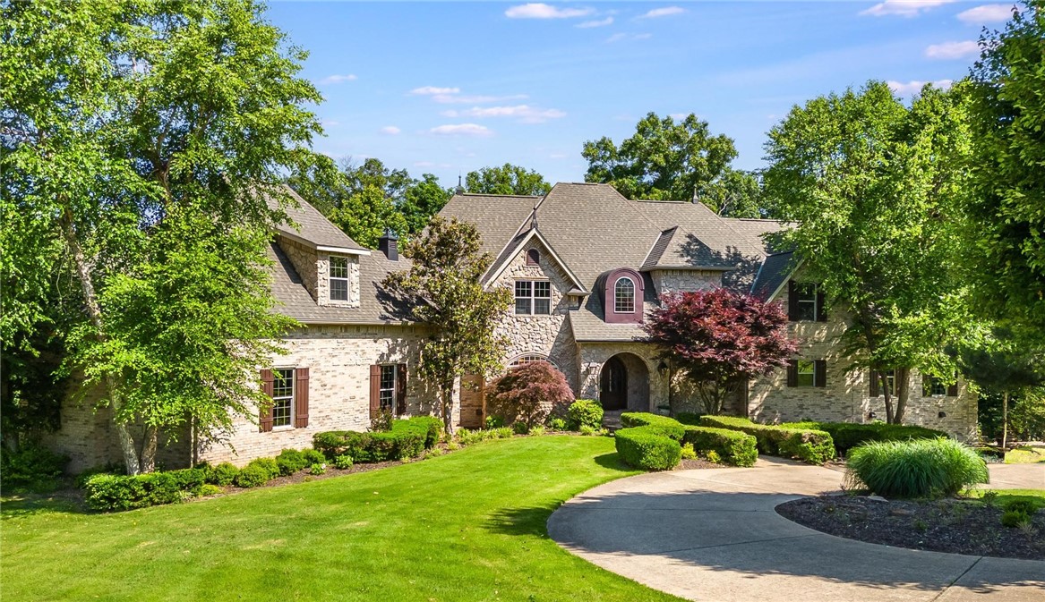 Welcome to Maple Manor, tons of natural beauty & luxurious living. Very private estate offers a serene retreat. As you enter, you are greeted by the great room with floor to ceiling windows looking into your private backyard. High end custom kitchen, with top-of-the-line appliances, perfect for entertaining guests and family. Plenty of room to have family stay in town with you. The master suite is beyond like any other with a fantastic closet room, while an attached nursery offers convenience. A dedicated movie room perfect for hosting guests, while the multigenerational floorplan ensures ample space. Bask in the sun-drenched exterior entertainment area. Here, a heated gunite pool with a water slide, a hot tub, accompanied by a fireplace and seating for unforgettable gatherings. Host guests in the separate guest apartment with its own private entrance. Seller is offering $100,000 in CONCESSIONS! put it towards paint, countertops, etc whatever you like! This is a unbelievable opportunity to own your dream home!