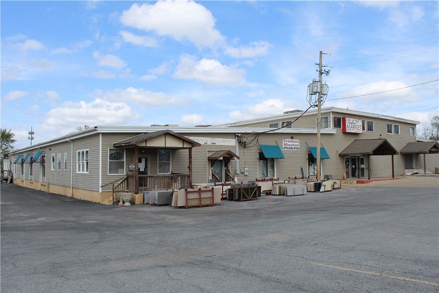 Development/redevelopment opportunity. 1 dock door and 1 garage door with ramp.
Cell tower generating $3,450/mo with additional income potential. Ample parking. 3-phase power.