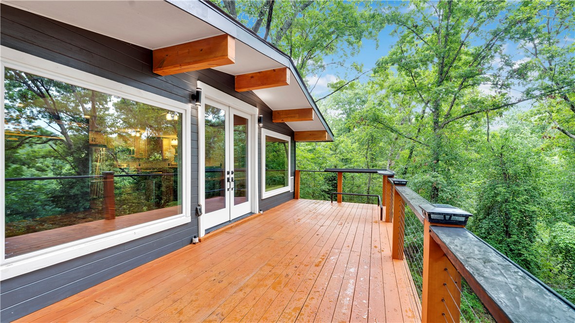 Step into this unique home that is move in ready. With almost a complete renovation inside and out. Home comes with a refrigerator, washer and dryer and a built-in kitchen table.
Here is a few to mention, New HVAC, flooring, doors, paint, Hardee board and extra large picture windows to a beautiful view of mature trees. Too many updated items to mention all, this is a must see home. Step out to your new deck the width of the home for perfect entertainment and relaxation. Lake Windsor is here for weekend entertainment and you can jump on a bike trail at the end of your property.