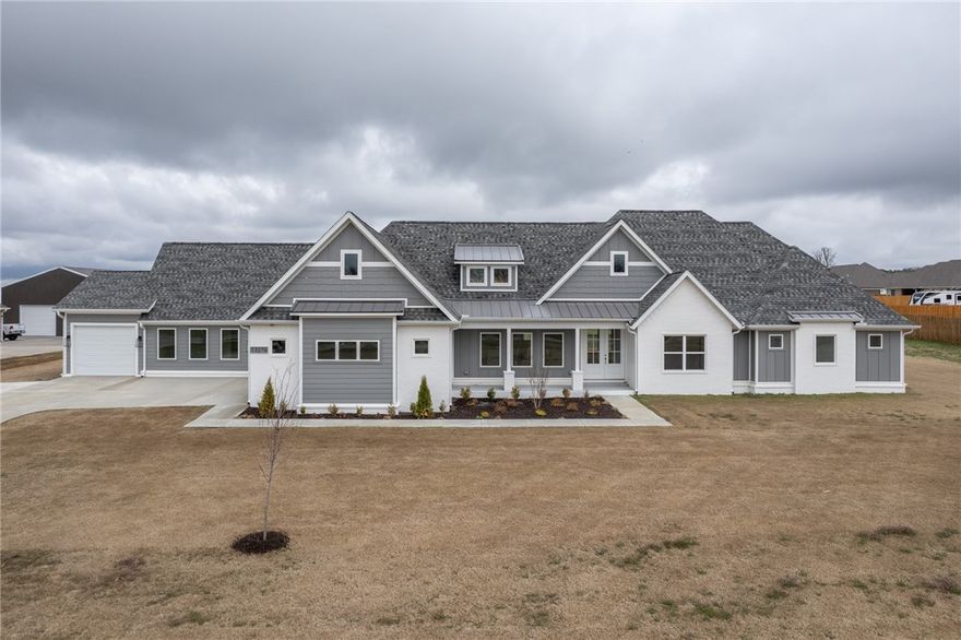 Introducing the perfect home for your family! This brand new 5 BR/4 BA, never lived in home is situated on a spacious 3-acre lot, offering your family privacy and room to roam. The open concept layout provides abundant natural light throughout and a cozy and inviting living room with fireplace plus beautiful luxury vinyl flooring and gorgeous finishes throughout.  Owner's suite provides a cozy retreat featuring a soaking tub, shower and huge walk-in closet.  Additional bedrooms are spacious  , providing room for a growing family. The gourmet kitchen is fitted with top-of-the-line appliances and ample granite counter space. A "mother-in-law suite" provides separate living space for extended family or guests. Located just outside of the Farmington City Limits you will enjoy the easy access to Hwy 62 and restaurants, parks, businesses and more. Don't let your buyers miss this one!