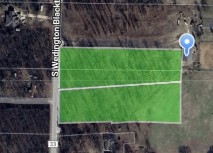 Hardwoods, paved road, and room to build—this 3.41-acre tract on Wedington Blacktop checks all the boxes. With electric at the road, city water from Lincoln and multiple build sites, it's a solid start for your dream home. Gently sloping, partially fenced, and surrounded by nature, but still just minutes from shopping and dining. No mobile or manufactured homes allowed. There has been perc tested for building a home.