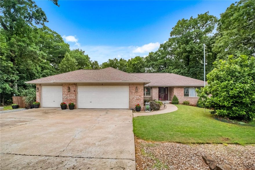 Charming Highlands home just waiting for you to make it yours. You will love the flowing floorplan with new carpet and recently installed bamboo wood flooring.  Kitchen loaded with custom cabinets and prep island that opens to the breakfast room full of natural light. Enjoy your morning coffee watching nature come to life from your screened in deck.  Primary suite with access to back deck perfect for perfect balance of indoor/ outdoor living.  Spacious guest bedrooms accenting the split floorplan.   Got hobbies?  The 3-car garage has built-ins for additional storage or take advantage of the heated and cooled lower level perfect for shop or gardening room.  Perfect location with easy access from 49- close to pickleball, golf, pub, pool, boat ramps, and the rest of the amazing Bella Vista’s amenities.  Need more privacy ask about the lot next door to bring your living space to .6 acres- or hold and sell later.  Lots of recent updates making this home ready to move in and start your Bella Vista Dream.