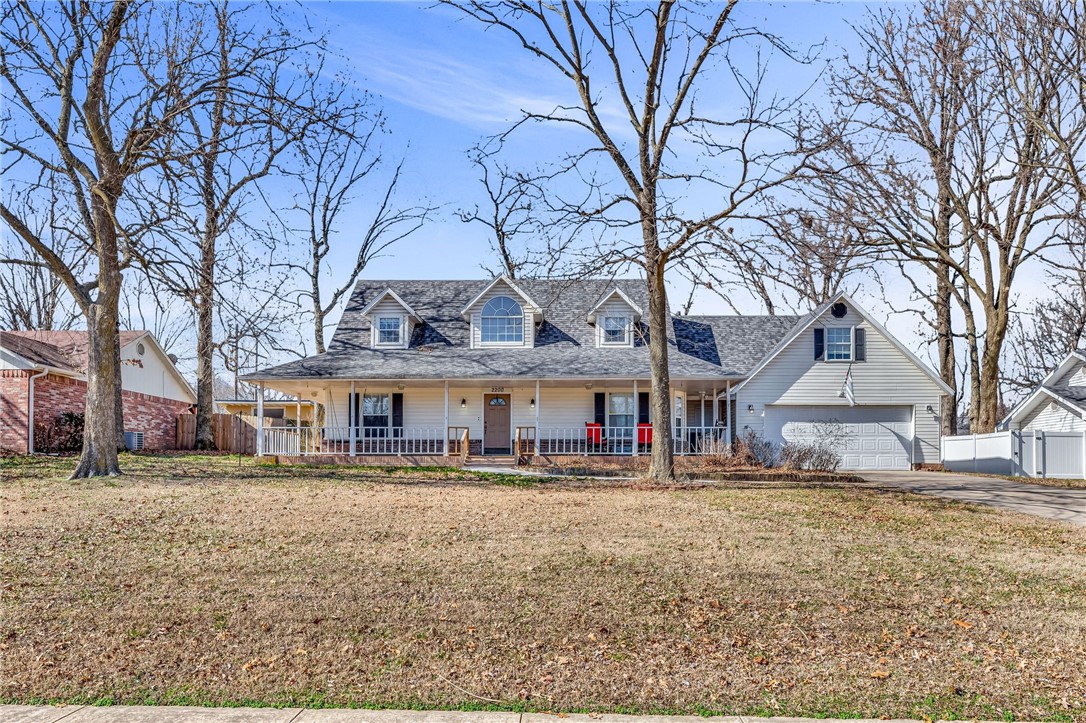 Centrally located in NWA, this beautiful home offers 3 bedrooms, 2.5 bathrooms, plus an office and a big bonus room! Located in a quaint neighborhood, this home sits on a quiet street with a cul-de-sac, convenient to JB Hunt Park and trails. It welcomes you with a large, covered front porch and beautiful stairway on the left as you enter and the office to the right. Master bedroom is on the main floor with a walk in closet and master bath. Up the first stairway is two bedrooms plus a bathroom and up a second stairway sits the big bonus room that could be used as a 4th bedroom, man cave, theatre, play room or just about anything you'd like! There are lots of windows for natural light and a covered patio in the back to enjoy the beautiful, level, fenced in yard.