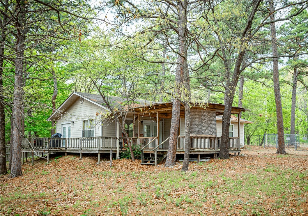 Rear view of property with a deck