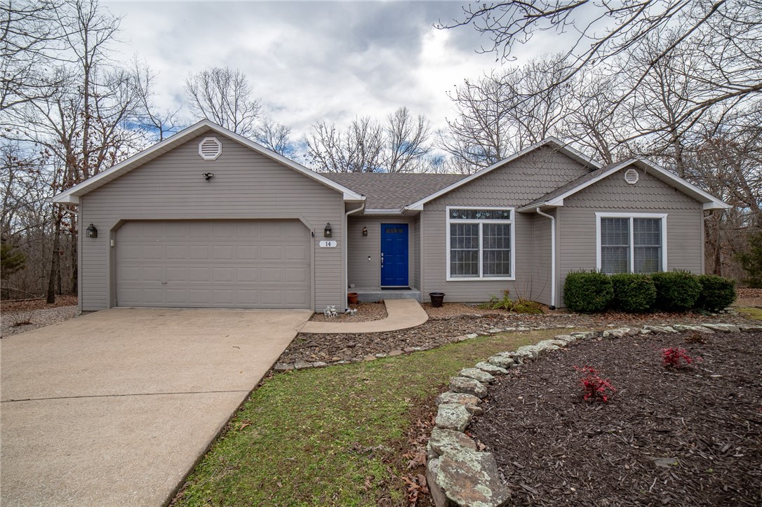 Delayed due to the snowstorm of 2022 but don't delay any longer! Adorable house with mostly level lot backing up to a wooded valley. This great open floor plan is perfect for entertaining. The large deck (replaced in 2021) and fire pit area allow you to take the party outside with ease. A new roof and gutters were installed in 2021. The new Bella Vista bypass makes this Loch Lomond and Branchwood area home easily accessible to the rest of NWA as well as the lake and country club amenities. Washer and dryer convey.