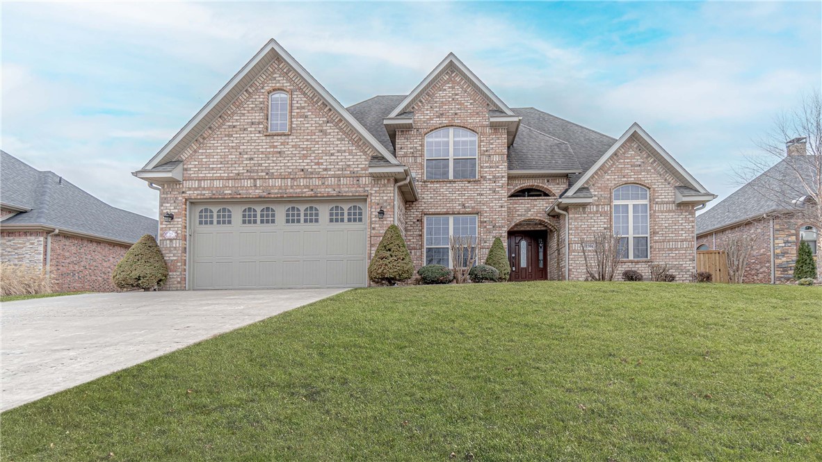 Gorgeous Rogers Home! Beautiful landscaped yard. This home was custom built 4br/2.5ba, game room, study, formal dining and bonus room. Venetian Ice Granite counters throughout home. Great location approx 1 mile from the Promenade.