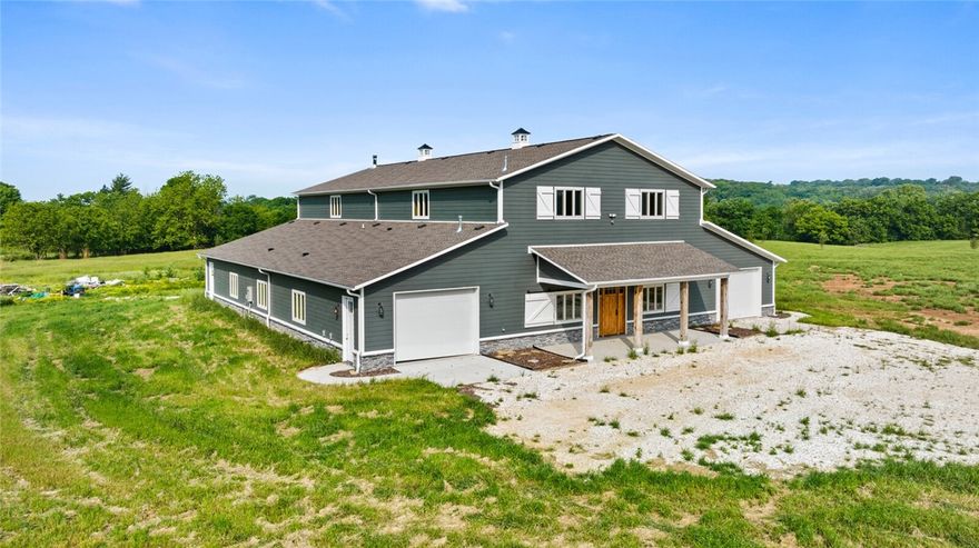 Discover the beauty of this remarkable property nestled on 19.77 acres featuring rolling hills, wooded areas, pastures, pond, watermill, and all backing up to a creek and natural conservation area. The centerpiece of this property is the custom-built, nearly complete barndominium that is ready for the new owner’s final finishing touches. Designed with both style and functionality, this home offers endless possibilities with an open concept design spread over 6,400 square feet. This peaceful setting is the perfect place to enjoy a country lifestyle while still being close to town.