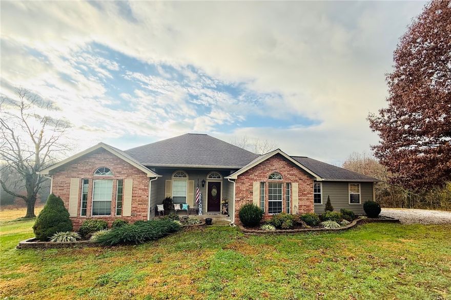 Welcome to this well-kept 3-bedroom, 2-bath home on 7+ picturesque acres in Green Forest. Built in 2014 and offering 1,648 sq. ft., this property is ideal for anyone seeking country living with modern comfort.

Step inside to an open-concept living area filled with natural light—perfect for everyday living and entertaining. The split floor plan provides privacy, while the spacious kitchen and living room flow seamlessly together.

Outside, the land is set up and ready for your livestock or hobby farm dreams. Enjoy 6.5 fenced acres, plus a three-sided horse shed featuring three 10x12 stalls. Additional storage comes easy with the carport, and the attached two-car garage provides convenience and protection from the elements.

A large back porch offers the perfect spot for gatherings, grilling, or unwinding while taking in the peaceful surroundings.

Move-in ready and equipped for country living—this property has everything you need to enjoy the best of the Ozarks.