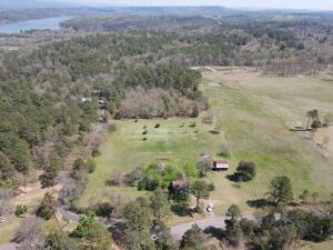 3 bed 1 bath house on 10.17 acres with shop building in johnson county arkansas.