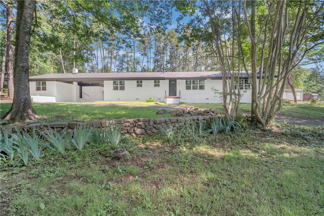 Wonderfully updated and remodeled home, new roof, new floors, kitchen, appliances, and newer HVAC. This home features a split floor plan large dining and living room with a cozy fireplace. Large separate room off the carport for a craft room, home office or play room. Large storage building, circle drive, dogwood trees and crepe myrtle trees and blooming flowers. Please no trespassing, real estate agent must be present. Don't miss this once a generation listing for this particular area of Perryville.