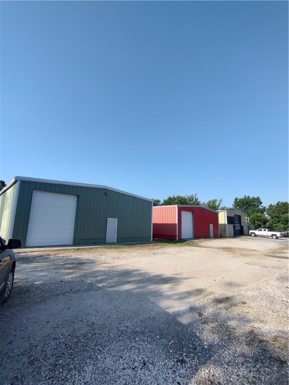 2.22 acres on major road frontage property has 3 warehouses on them that are tenant occupied. No showings until accepted contract. 2 of the warehouses are month to month contract, one is longer. Listing broker is related to the owners.