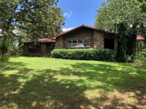 ONE OWNER HOME... the perfect location is what you will find with this 3 bdr, 2 bth, double sided fireplace, large living room, large bedrooms, metal roof, situated on 1.5 acres m/l just minutes from town, walk across the street to Center Valley School or Center Valley Grocery. It offers a view & a paved drive.
