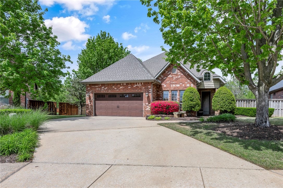 Amazing location down the street from Crystal Bridges American Museum of Art, Alice Walton School of Medicine, Amazeum, and Orchards Park. Easy access to trails, entertainment, fine dining and the interstate. Large living room with gas fireplace, tons of natural light, coffered ceiling accents and open floorplan. chefs kitchen with granite countertops, custom cabinets, gas range, refrigerator, stainless steel appliances, under cabinet lighting, pantry and eat in area. Large primary bedroom with spa like ensuite bath including double sinks, walk in tile shower, jetted tub and walk in closet with access to the laundry room. Study with wood flooring, french doors and crown molding. Landing area on the second floor with built in shelving and two oversized bedrooms. Nest thermostats, home audio, central vac, washer/dryer and security system. Beautiful private backyard with extended patio for entertaining, mature trees, landscaping and privacy fence. Enjoy the community amenities including pool, playground and trails!