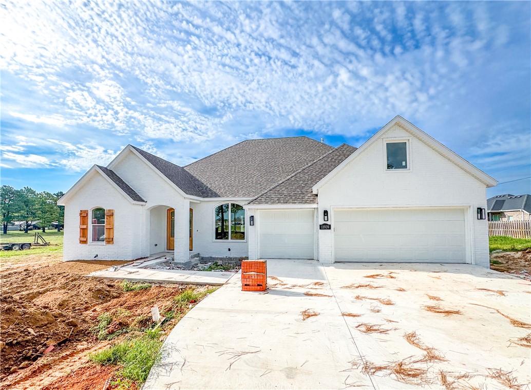 Brand new home being built on a beautiful 1.62 acre lot with mature pine trees! Home features a spacious open layout, large kitchen island, large picture windows, quartz counter tops, hardwood floors, custom built cabinets to the ceiling, gas range, large covered patio, 3 car garage, and so much more! Home is 2771 square ft. and has 4 bedrooms, 2.5 baths, plus an office! 4th bedroom is upstairs and could be used as a bonus/media room. Get in now, and pick your finishes and colors! Finished pictures are of similar floor plan (finishes, layout, and other features may vary). 1 year builders warranty included