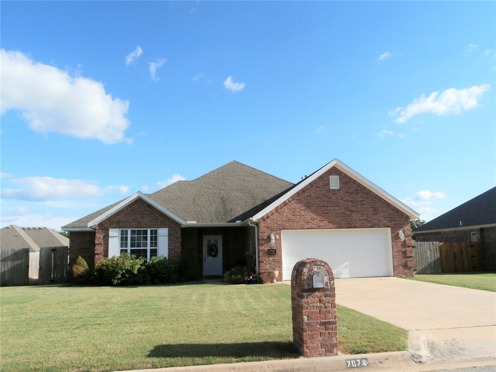 A very nice split bedroom floor plan with this wonderful family home. Large living room with a corner gas log fireplace. Roomy kitchen with lots of cabinets and counter space. Master bedroom is close to all living areas and separated from guest/kids rooms. There is a nice covered patio in the rear with a privacy fenced yard. Just a couple of blocks from swim park, walking trails & baseball fields. Close to Historic Downtown Prairie Grove.