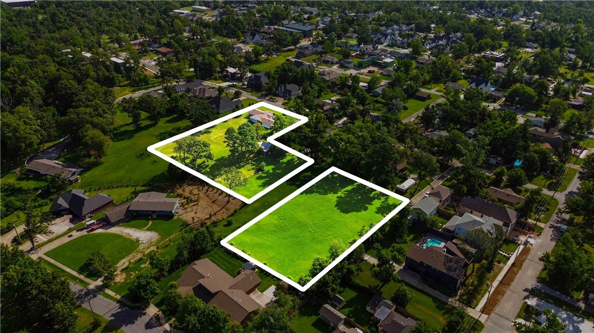 RARE OPPORTUNITY TO OWN 2.51 ACRES IN A PRIME BENTONVILLE LOCATION! The NW corridor is the hottest area in town for new residential development. Two parcels on NW C at 8th St, totaling 2.51 acres. Walk or bike to the Bentonville Square, Crystal Bridges, Park Springs Park, the Razorback Greenway & Mtn. bike trails, shopping, restaurants and entertainment venues. 10 minutes to the new WM Campus. The main parcel includes an older 2295 sf home & barn but the value is in the land. The 2 parcels are separated by a city-owned Right-of-Way designated as NW 8th Street, which would require completion as part of any future development. Showings by appointment only.