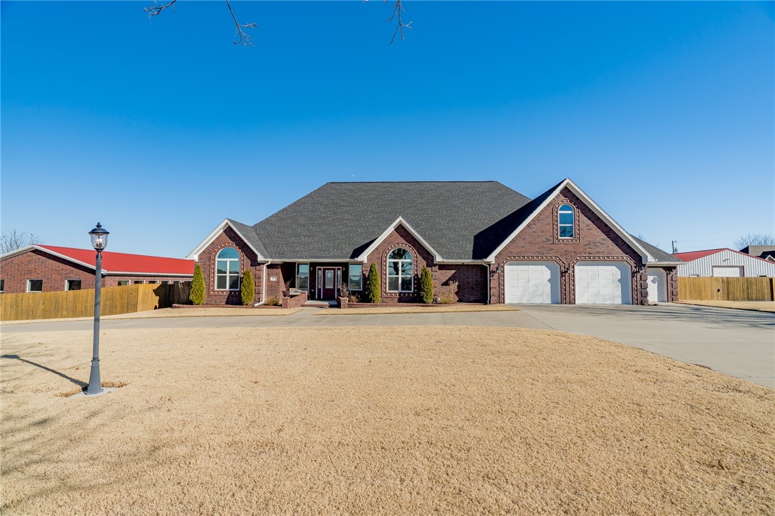 Privacy and views everywhere. 4600 Sq Ft house, huge rooms hosts a private office, huge living room with gas fireplace. Kitchen is a cooks dream, beautiful granite island tons of cabinets with top of the line appliances. Huge heated and cooled sunroom overlooking the valley. Central vac, alarm system, as well as security cameras, sprinkled front and back. Huge indoor pool complex, swim year round ( 64 X 34). Heated shop building 64 X 34 with roll-up doors. Home has generac generator.