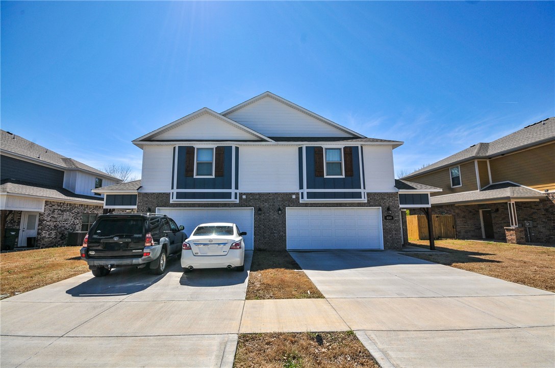 Welcome to Rupple Meadows! This new luxury home has 3 large bedrooms each featuring their own full-sized en-suite bathroom. The house has an open floor plan kitchen and living room, and includes a half bath in the main living. All appliances are included. There's a 2 car garage with room for 2 more cars in the driveway. Rupple Meadows subdivision is just off Wedington and just over 1 mile to I-49. Very close to shopping, restaurants, coffee shops, and the Fayetteville Iams Dog Park. Come see this beautiful place for yourself!