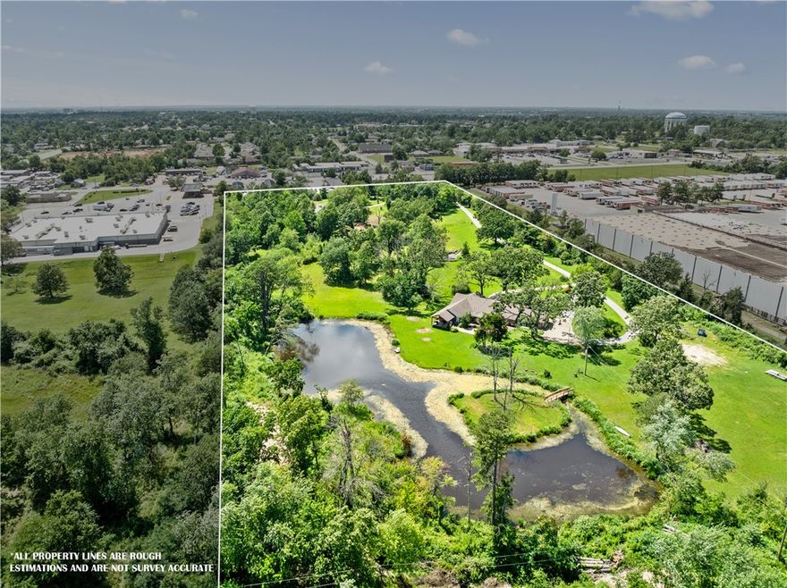Over 13 Acres with direct access to 71 Business and New Hope Rd.  Prime Commercial location near multiple large business districts. This property features 2 homes on site, one home operates as an Airbnb property and fronts private pond. The second home on site is undergoing current remodel, could be used as a secondary Airbnb, Office, or Retail. Fantastic land value in this location, zoned highway commercial with no covenant restrictions, this site has endless potential. Great location for storage buildings, office space, warehouse, and more. 400 Lilac property is 3,327SF and features a 3 Bed Home plus Office and 4 Bathrooms, the home has great features including large formal dining, stone fireplace, sunroom, and more. Currently used as an Airbnb property with wooded setting, private pond, and 10.86 AC. 711 Lilac features 2.49 AC, the 2,257 SF home is currently in renovation. Don’t miss out on this prime investment opportunity!