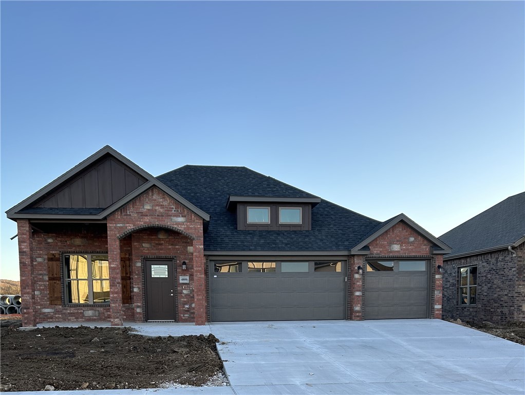 Remarkable New Construction home in Fayetteville! This home offers 3 bedrooms, 2 baths, and a 3 car garage. Kitchen is complete with stainless steel appliances, gas cooktop, wall oven, microwave, pantry, and granite countertops. Large fireplace in the living room is the perfect focal point. Details throughout include wood cased windows complete with 2-inch blinds. Large front porch, fully sodded yard gives the home tremendous curb appeal. Keyless pad on garage door for ease of access. Primary bath has an oversized tile shower. Exterior brick construction creates long life and ease of maintenance. Covered back porch and super curb appeal makes this a must see home.