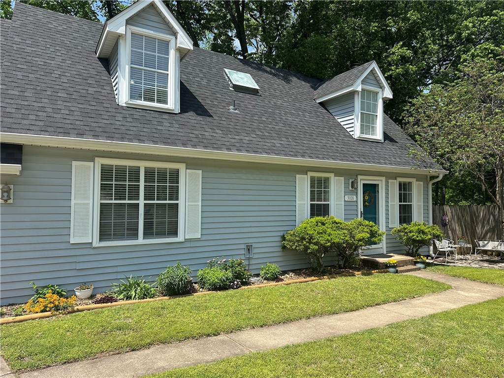 Bright energy and light fill this sun-kissed dollhouse awaiting you in this charming east Fayetteville neighborhood directly across from Vandergriff and McNair Schools. Nestled at the end of a cul-de-sac, this darling home offers 3 bedrooms, 2 baths and 2 living areas or use the bonus as a 4th bedroom. New roof 2020, comprehensive HVAC updates and duct cleaning 2024, new Smart Thermostat, new BlueTooth Speaker/Fan in upstairs bath, OzarkGo Fiber Optic Internet, wood-burning fireplace w/gas start. Well-sized rooms, built-ins, window seat storage, skylights throughout. Convenient laundry upstairs. The best and biggest backyard with a huge multi-level deck. Seller offering $3,000 credit to buyer at closing, *with acceptable offer.