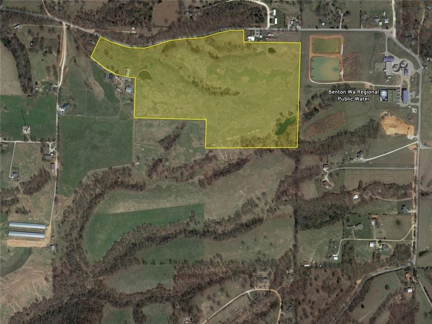 Developmental Potential! 49.73 Acres on Woods Lodge Rd. on the border of Rogers/Avoca/Garfield. Estimated 1500’+ Woods Lodge road frontage. Cleared and level land with pond. Value in land and location. Easy access to Rogers Municipal Airport, Downtown Rogers, and I-49. Fast growing area and an ideal investment opportunity!