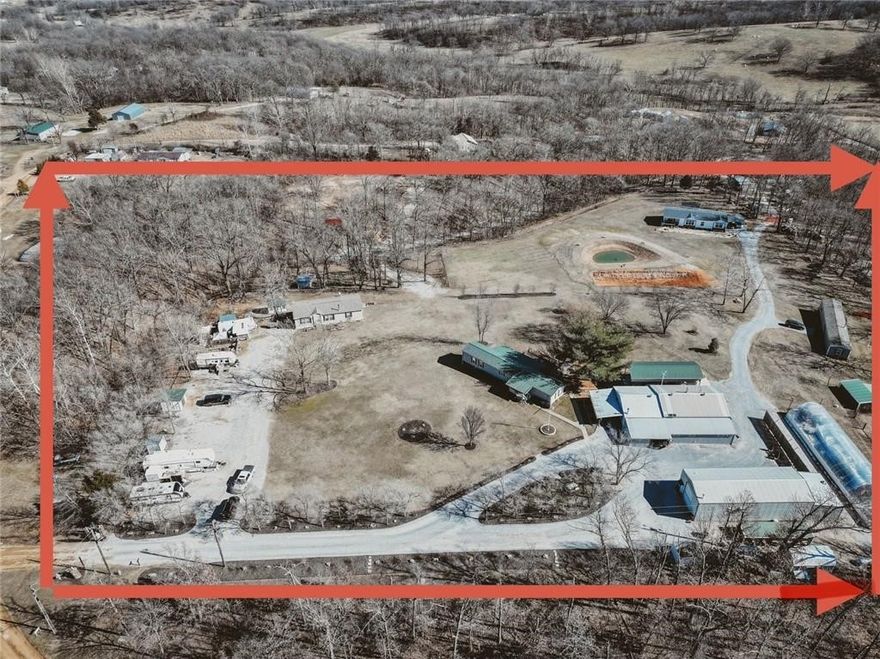 Unique Property with multiple rentals. Doesn't fit one category. Call agent for complete brochure.
10 RV spots with full hookups. 4 very nice 3/2 manufactured homes ( 2004-2023). 1- 2 BR barndominium very upscale finishes. 1 community building with laundry, his and hers full bathrooms, large open room for gatherings. Great income property or family compound, church camp, and room for RV expansion or more homesites. Also listed as residential MLS # 1334221