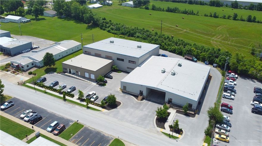 Sale-leaseback overview
Available: 31,552 sf | 1.83 ac.
Asking price: $3,850,000.
Zoning: I-1.
Dock level door: 2.
Grade level door: 2 (1 with small step-up).
Power capacity: 208V - 480V 3-phase w/ 600 amps.
Parking spaces: 30 – 45.

Tenant & leaseback term
Tenant: ActionPaq Corporation.
Leaseback term: 36 months.

Site highlights
This fully conditioned ±31,500 sf industrial facility includes ±26,500 sf of warehouse space and ±5,000 sf of office space. Equipped with five rooftop HVAC units and one additional hanging unit in a designated subsection, the building offers climate-controlled functionality throughout. It is fully sprinkled and features two dock-high doors and two grade-level doors, providing flexible loading access. Zoned I-1 and surrounded by manufacturing and industrial uses, the property is ideally situated just 2 miles from I-49.