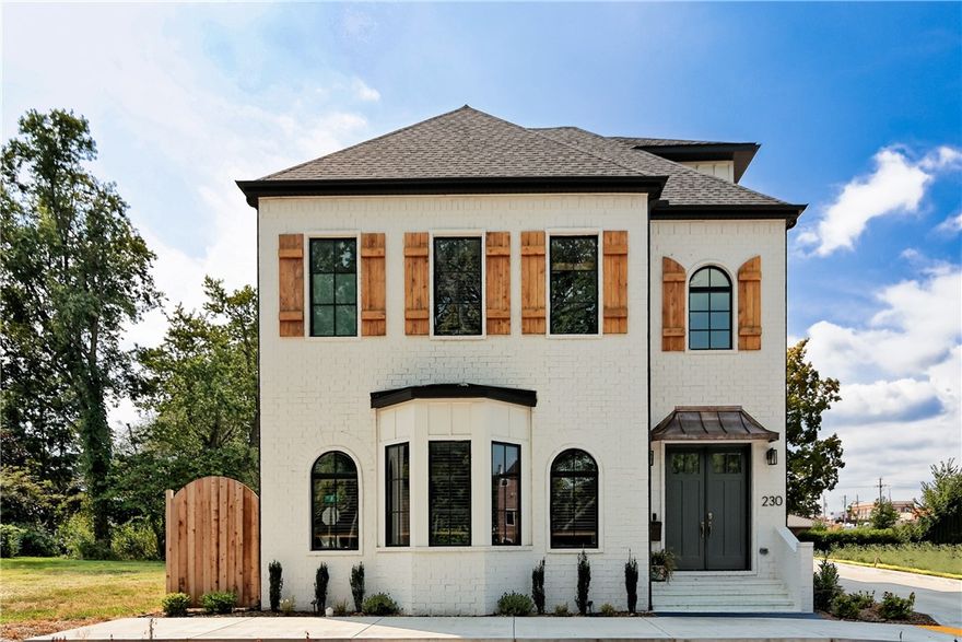 Two blocks from the Bentonville Square and all that Downtown Bentonville has to offer. This home has so many possibilities. The main house is 3,550 sq ft. The 2 bedroom garage apartment is 1,258 sq ft. The 4 car garage, which is heated and cooled, is 1,290 sq ft and fully carpeted. Zoned for commercial or residential which opens up so many possibilities. The first level has an open living room, dining room, and kitchen. Brick accent walls and beautiful wood beams make the large open space feel cozy and intimate. The large granite island makes both cooking and entertaining a breeze. The first level also has a home office with glass French doors. The master bedroom and two additional bedrooms are on the second floor along with the utility room. The third level has a media/bonus room and 4th bedroom. The interior photos are not of the actual house but a similar home built by the same builder. Finishes are the same. Just 1 block from the Razorback Greenway.