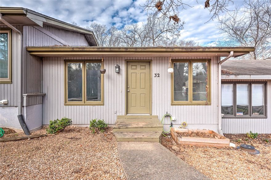 Perfect rental or personal home! This updated 2-level townhouse is close to the country club and bike trails. Features 2 Primary Suites (one on each level), an office/2nd living area with a large walk-in storage room downstairs, new flooring, quartz counters, central vac, & all appliances convey. Existing home warranty conveys! "Sold As Is"