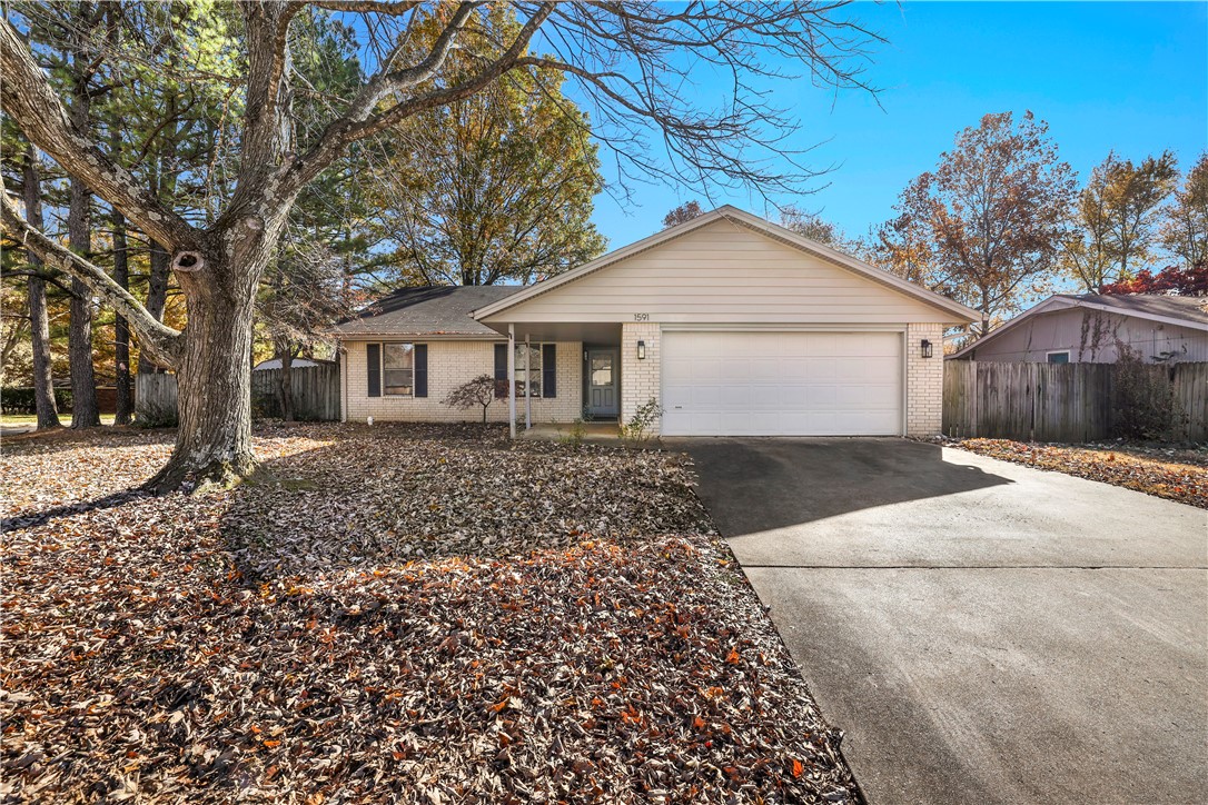 It's hard to find a home this good at this price point! This Rolling Hills cutie sits on a large corner lot with a well maintained brick exterior and updated fixtures. The large living room features warm beams throughout and a brick fireplace that adds a ton of character to this ranch style home. Laminate flooring runs through the living space into all bedrooms, meaning no carpet at all! The backyard is the perfect size for entertaining, with an extended deck and covered patio. This home is ready to move-in, but still has room to add your flair!