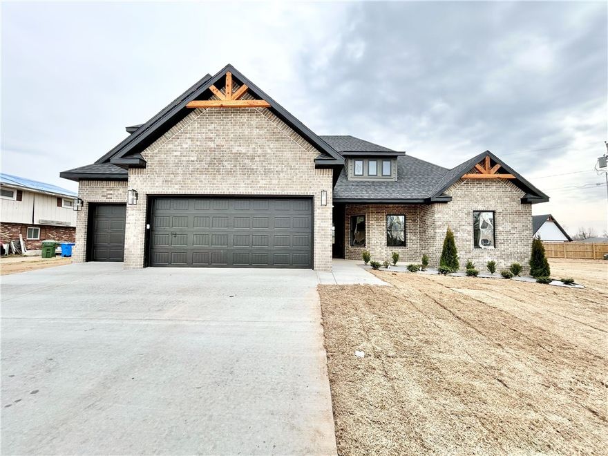 Check out this stunning new construction home with a 3-car garage on a .44 acre lot! Desirable location with easy access to I-49, Pinnacle Promenade, and downtown Rogers! Split floor plan. 4 bedrooms + bonus room! Wood privacy fence! The primary suite boasts a large walk-in tile shower and a luxurious soaking tub for relaxation. The kitchen features floor-to-ceiling custom cabinets and a gas cooktop, complemented by elegant 3 cm quartz countertops. Custom finishes throughout. As an added bonus, receive $3,500 towards buyer's closing costs when working with the builder’s preferred local lender! Schedule your showing today!