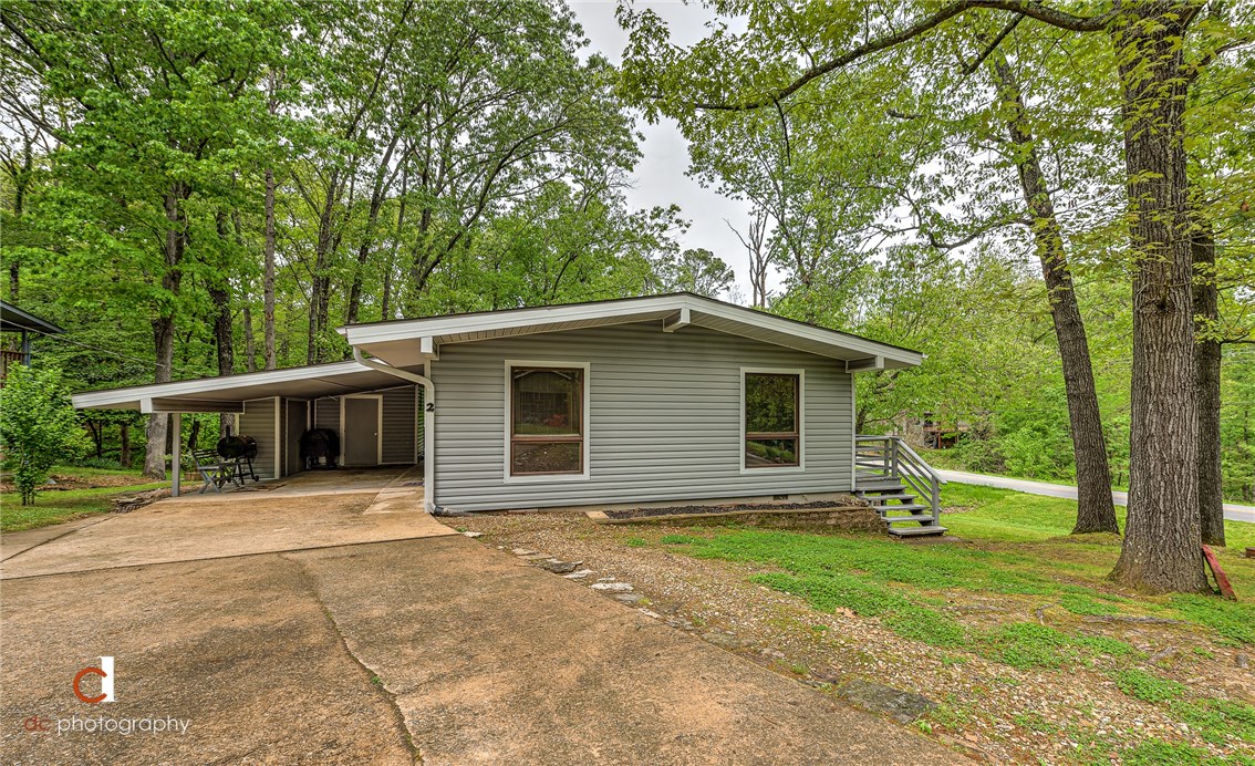 A true Bella Vista charmer! Close to trails and all the amenities the area has to offer. Why rent when you can buy for less? RD loan eligible for ZERO down. Includes 1 year home warranty. Enjoy peaceful serenity in this oasis just outside of town and still close to everything. Just steps away from hike and bike trials and golf courses. Bella Vista offers 7 lakes; 7 golf courses; 6 private restaurants; 3 private pools and a beach, camping, gun range, and more! 12 minutes from Walmart Home Office and Downtown Bentonville. Quiet subdivision that is family friendly in Bentonville School District. This is a must see property!
