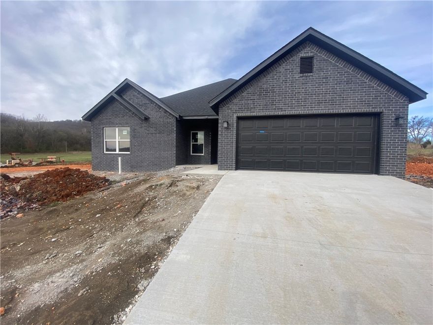 great new home in exciting new subdivision use our preferred lender (Momentum Loans) get a free 1% rate buy down  or get $2500.00 in byers closing cost. Or get 0 down to qualified buyers with an RD loan. Refrigerator included. Home is priced at $182.50 sf compared to $200,00+ sf for the rest of the homes listed in this subdivision. Great opportunity for big equity for home buyers or investors investors.