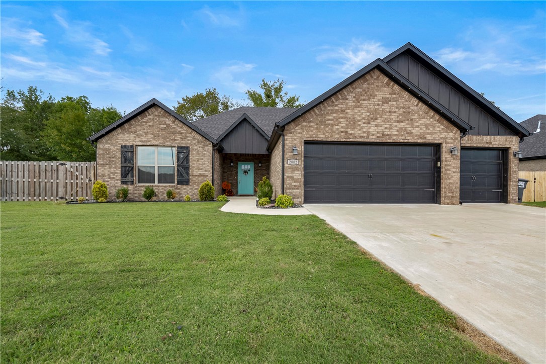 You are going to love this 4-bedroom 2.5 bath home built in 2020 with all the extras. This home offers an open concept with split floorplan and high ceilings throughout. The gorgeous kitchen has granite counters, large island, large walk-in pantry with sliding barn door, tiled backsplash, stainless appliances, gas cooktop, custom cabinets and hood vent. The spacious living room is open to kitchen and dining area. Shiplap detailing around the fireplace, wood look tiled flooring in hall, bathrooms, entryway, kitchen, living room & laundry room. Master suite highlights include crown molding, tray ceilings and large walk-in closet that wraps around into the laundry room. The main bath features a dual vanity with whirlpool tub and tiled walk-in shower. 2.5 cm granite throughout including guest bath with double sinks. The 3 other bedrooms have walk-in closets. Other features: attic storage, built-in shelves in garage a built-in hall locker, high speed internet, exterior outlets for Christmas lights, keyless entry