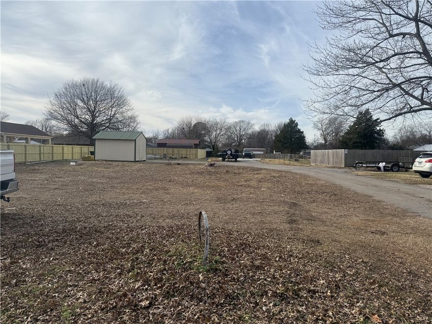 Ideal location for duplexes or three to four family residental townhouses.  Currently under city approval for MF-4 zoning classification.  0.52 +/- acres with room to build 4 townhouses. Property close to all NW Arkansas has to offer, including biking and Razorback Greenway Trail.  Don't miss this opportunity for multi-family space to make your own, great location, property is ready to go.