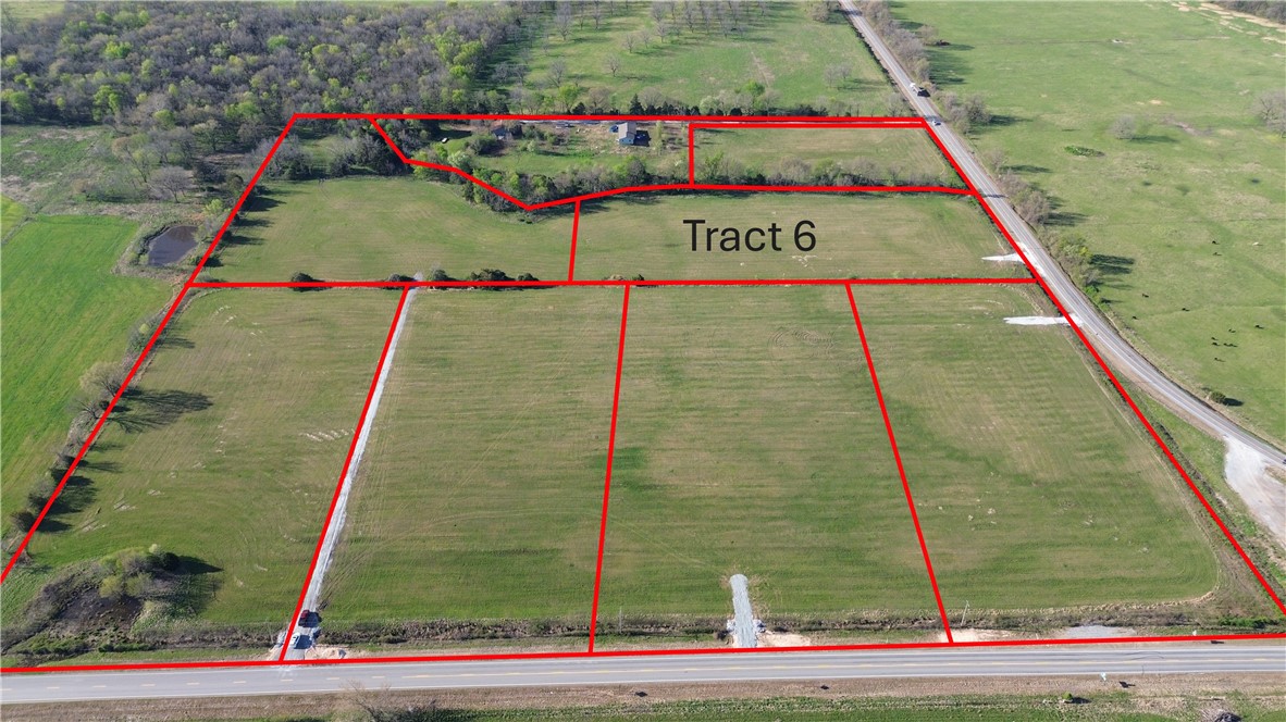 Tract 6 is located off of HWY 43 in western Benton County. Upon finalization of the survey/plat, Tract 6 will be 6.13 m/l acres. Located off of paved road with electric and rural water at the street, this tract provides an excellent opportunity to live in the country but have convienent access to Gravette, Decatur, Siloam Springs and the rest of NWA.