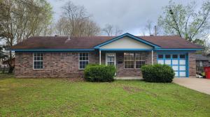 Hard to find brick home with nice fenced backyard. 3 bedrooms, 2 full bathrooms and even a one car garage. But wait there's more; covered patio area, storage building, tile floors throughout and appliances convey.