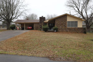 Take a stroll back in time, to quality construction, comfortable living, nice neighborhoods and small hometown convenience. This home features 3 bedrooms, 2 baths, a large family room and 2-car carport. There's also a covered front porch and covered patio overlooking the large backyard. Additional storage, and refrigerator will convey.