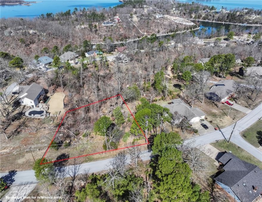 Don't miss the opportunity to build in this desirable area.  This lake area lot is a perfect location for your dream home.  Nestled in a well- established quiet and private neighborhood.  Here you will have convenient access to Boat ramps and Downtown Rogers.  Key distances:  Hwy 12 boat ramp approx. 2 miles, Prairie Creek Boat Ramp approx. 5 miles and Eureka Springs is approx. 17 miles.  With the many events scheduled in both Downtown Rogers and Eureka Springs you will have quick access for whatever venue you are looking for.