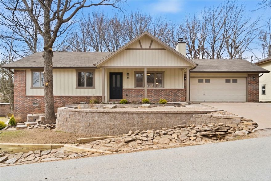 If you are looking for a beautiful and affordable home just moments from Lake Avalon, you've found it!  Don't miss this welcoming home in a perfect location, curb appeal and function radiating from the moment you pull up. You'll love the high ceilings and open living area, the functional layout and all the modern updates!  Picture yourself enjoying your afternoons in the sunroom overlooking your peaceful, fenced yard, or just take a look at the stylish finishes of your new kitchen and bathrooms.  Everything here has been redone with great care, from flooring, paint (inside and out) landscaping, light fixtures and so much more!  Nothing left but to move right in and enjoy living in this friendly neighborhood just up the street from the community beach area and close to bike paths and all the beauty Bella Vista has to offer.  Don't forget to check out the unfinished workshop space under the home, perfect for storage or a project space!