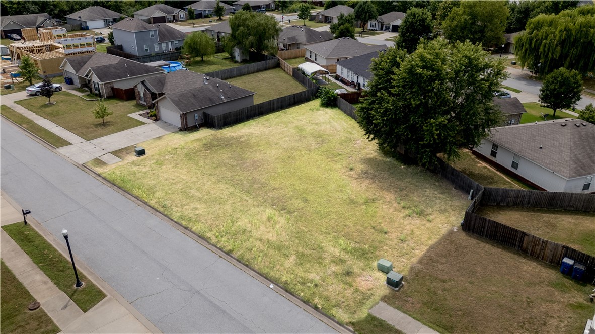 Welcome to an exceptional land opportunity at 5404 SW Remington Rd! This prime 0.2-acre piece of
property offers a unique chance to build your dream home or invest in a thriving area of Bentonville, AR. Located in an already established neighborhood, this land presents the perfect canvas for your custom home design. The lot benefits from existing infrastructure and community amenities, making it an ideal choice for those looking to build without the challenges of a completely undeveloped area. The property's location near the Walmart Regional Distribution Center makes it an attractive option for long-term investment, with potential for robust rental demand or future resale value. Families living here will
appreciate the proximity to Fulbright Junior High School. Don't let this chance slip away. Schedule a visit
to the property today and envision the possibilities that await at 5404 SW Remington Rd!