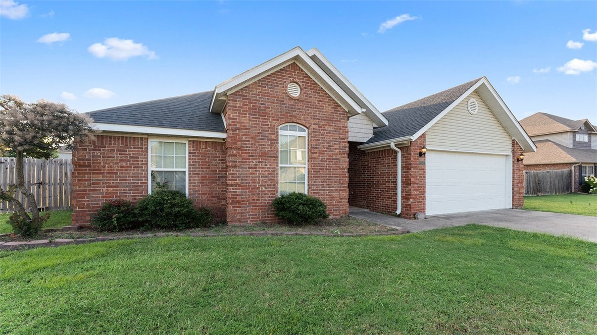 This inviting brick home is a perfect place to call your own, featuring a generously sized backyard that offers endless possibilities for outdoor fun, relaxation, and entertaining. The large living area with an eat-in kitchen serves as the heart of the home, providing plenty of space to create memories with family and friends. A cozy gas fireplace adds warmth and charm, making it the perfect cozy spot. The primary bathroom includes both a shower and whirlpool tub, as well as a huge walk-in closet. A newer roof offers durability and protection, so you can enjoy peace of mind for years ahead. Situated toward the end of a quiet street in a well-cared-for neighborhood, this home is ready to welcome you. Approved borrowers will receive a closing cost credit of 1% of the loan amount up to $5,000 on their Closing Disclosure on their loan closing with Envoy Mortgage Branch NMLS #2659248 and Branch NMLS #2579798.