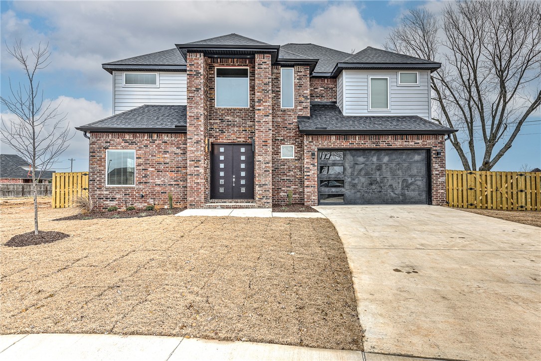 Beautiful modern style custom home (WEST FACING) conveniently located minutes from everything Bentonville has to offer; just around the corner from Central Park School, Bentonville Community Center and 11 minutes from Walmart Home office. This home offers 4 bedrooms, 3 bathrooms, Office and a newly finished bonus room upstairs. Open concept with high end finished throughout like wood floor, quartz counters, LED lighting. Open loft area on second floor overlooking downstairs to the living room is one of the features that make this stunning home stand out. Welcome Home! Schedule your private showing NOW! Washer/Dryer and Fridge may convey with the right offer. Master and Office have wood floor under the carpet that was installed recently.