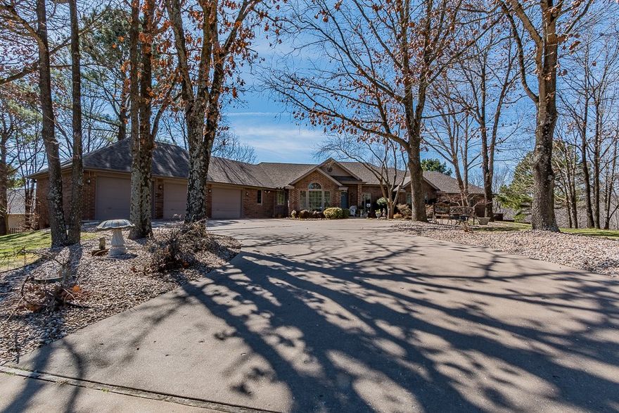 Back on market. Buyers financing fell through.  Looking for unparalleled quality in an park-like setting with expansive views? Than this is it. Situated on 2-level lots overlooking the 13th green of Scotsdale Golf Course, this home will exceed your expectations. Poured concrete foundation walls, 6" exterior walls, Roof approximately 8-years old, 3/4" Red Oak flooring on main level. To much to list. No expense was spared on this Gene Knight custom home. Don't miss out, call today for your private showing.